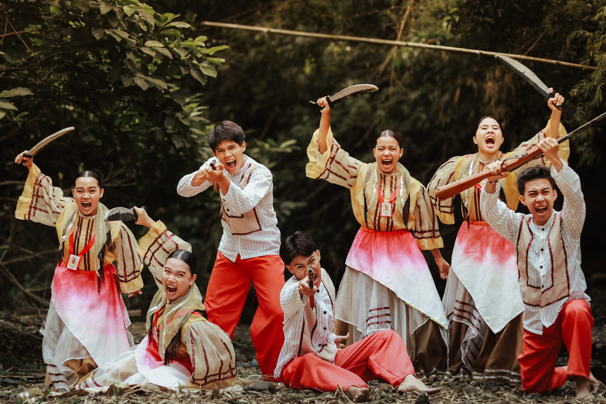 Cry of Jelicuon performers charging in the war reenactment