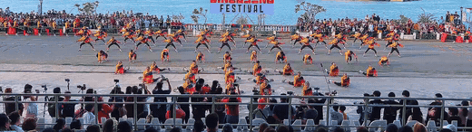 Cry of Jelicuon performers driving a synchronized routine at high tempo