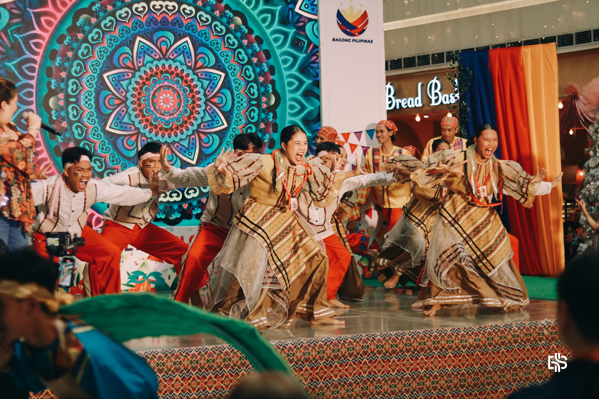 Cry of Jelicuon performers dancing to live music, with a saxophonist and singer providing the sound