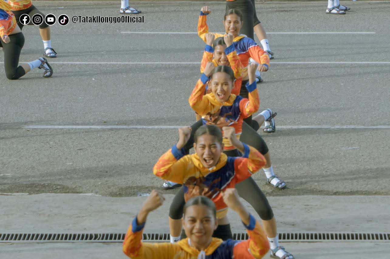 Cry of Jelicuon performers flexing and bracing during warm-up drills